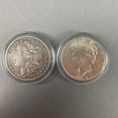Lot 227 | 1880 Morgan and 1923 Peace Silver Dollars

