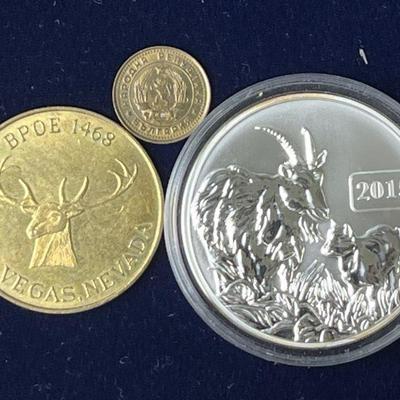 Lot 98 | 2015 Tuvalu 5 Dollar Silver Goat Coin & More
