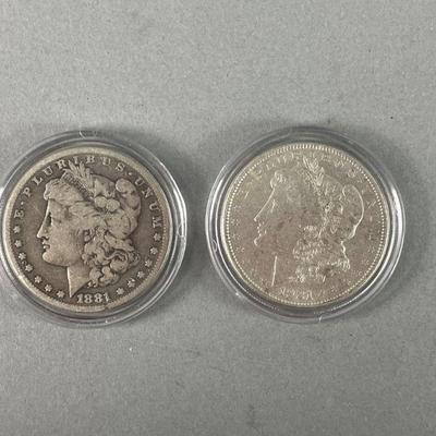 Lot 254 | 1881 Morgan and 1921 Morgan Silver Dollars
