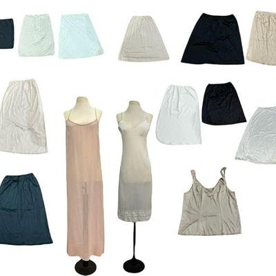 A Large Collection of Vintage Slips and Slip Dresses