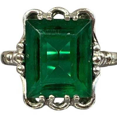 A 10k White Gold Ring with Green Stone