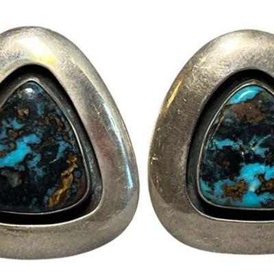 A Pair of Sterling Silver and Turquoise Cufflinks