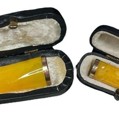 Two Art Deco Butterscotch Amber Cigar Holders