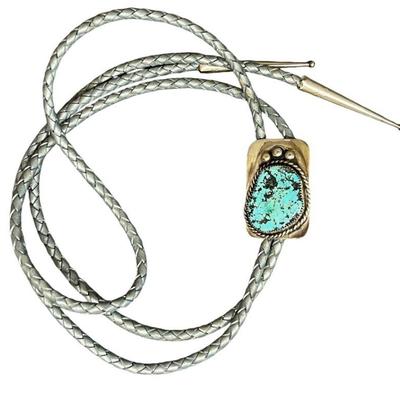 A Silver and Turquoise Native American Bolo Tie
