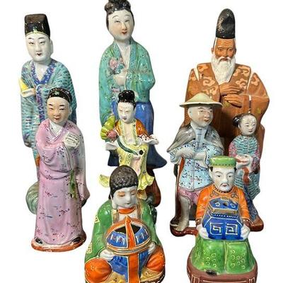 A Collection of Asian Statues and Incense Burners