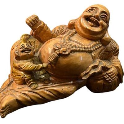 A Carved Wood Buddha Sculpture