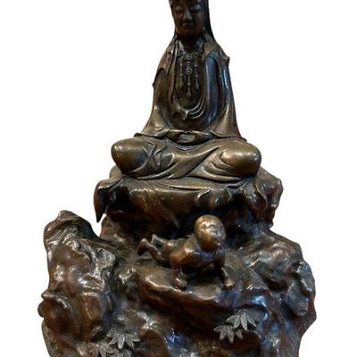 A Cast Bronze Buddha and Child Sculpture