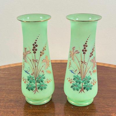 PAIR PAINTED GREEN GLASS VASES | With gilt rims and leafy decoration. - h. 9 in

