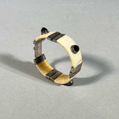 SILVER, GEMSTONE & CARVED BONE HINGED BRACELET | Carved bone bracelet with silver clasp & hinges mounted with faceted stones. -...