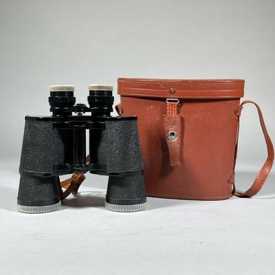 ATCOLUX BINOCULARS | Atco Lux 7X50 fully coated optics binocular, no. 479753, with a leather neck strap and in a fitted Atco leather...