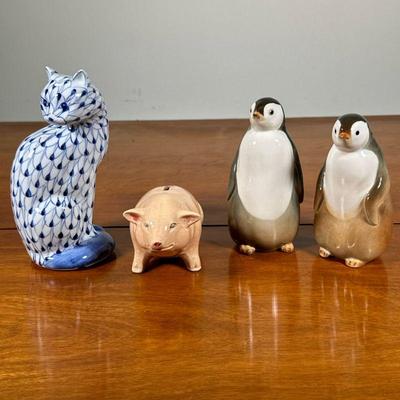 (4pc) CERAMIC ANIMALS | Including: pair of penguins marked on bottom “Made in Russia”, ceramic pig coin bank, and Herend style ceramic...