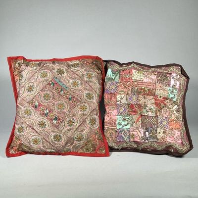 (2pc) BEADWORK PILLOW COVERS | Two throw cushions intricately decorated with beadwork and embroidery, one having a red fabric ground, the...