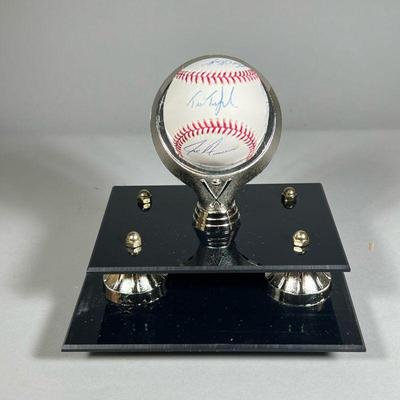 [METS SIGNED BASEBALL] Ken MacKenzie, TIM TEUFEL, ET AL. | With eight signatures, including Ken MacKenzie, in a display stand / lucite...