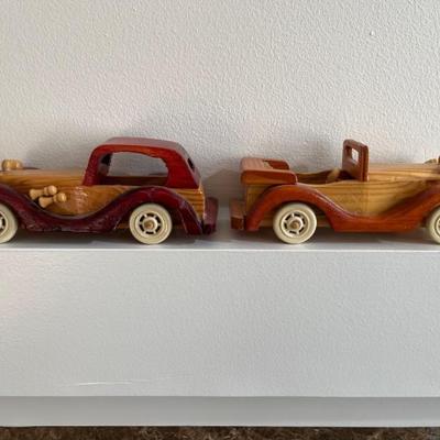 hand carved wooden cars