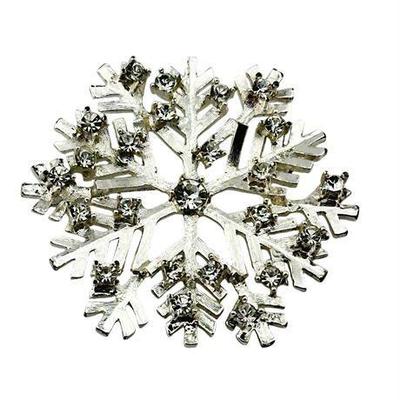 Lot 120   
Silvertone and Rhinestone Snowflake Brooch