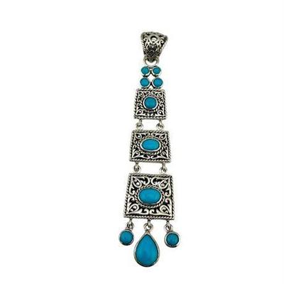 Lot 10   
Sterling Silver and Turquoise "Sleeping Beauty" Articulated Pendant