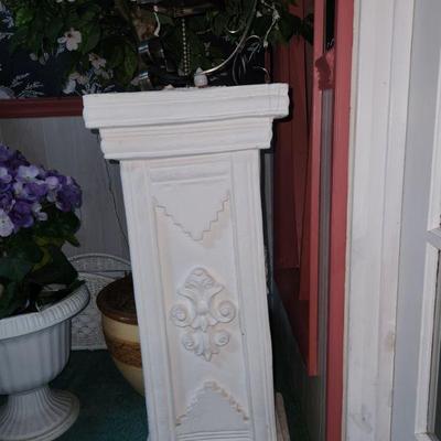 2 stone pedestals 
