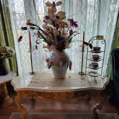 Coffee table and floral arrangement