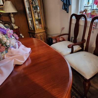 Wooden dining table with 4 chairs
