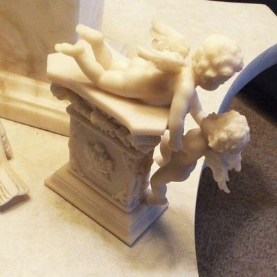 CARVED DECORATIVE STONE AND PLASTER ELEMENTS