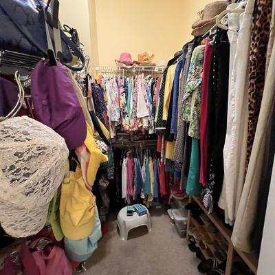 CLOTHES CLOTHES AND MORE WITH PURSES AND SHOES CASUAL AND EVENING SIZES VARY FROM MEDIUM TO LARGE