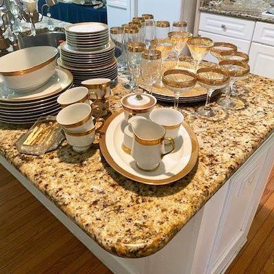 FINE CHINA WITH GOLD RIMS AND TIFFIN CRYSTAL STEMWARE WITH GOLD RIMS