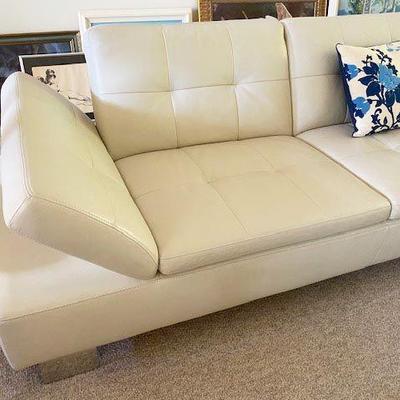 THIS DESIGN IS SO INCREDIBLE THAT THERE IS A MECHANISM TO RAISE AT A SLANT AND HOLD THE END SECTION TO PROVIDE AN ARM OR HEAD REST.