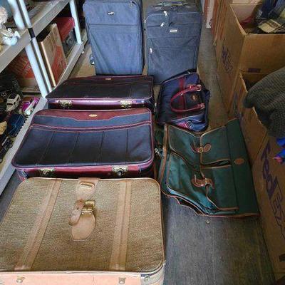 #3242 • (6) Suitcases and (1) Garment Bag
