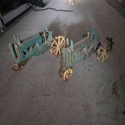 #3254 • (2) John Deere Cast Iron Tractor Toys
