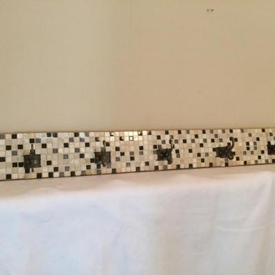 Handmade tile laid $50