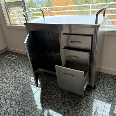 Sale Photo Thumbnail #74: Stainless Steel Rolling Cabinet Cart - has 1 interior shelf. 