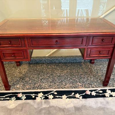 Rosewood tone Writing Desk with protective glass top. L 54in | D 24in | H 30in