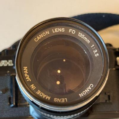 Canon 135mm Lens attached to Camera