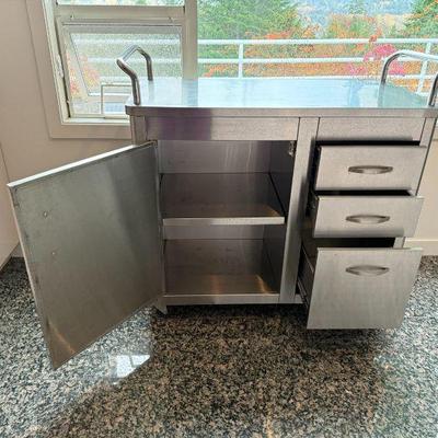 Stainless Steel Rolling Cabinet Cart - has 1 interior shelf, 3 drawers.