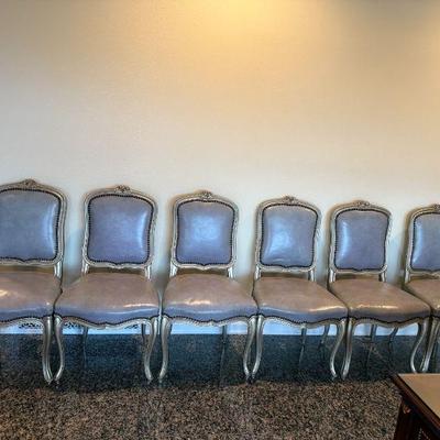 6 Louis XV Style Dining  Chairs with Antique Silver Painted Wood Frame, Grey Distressed Leather, Upholstery accented with antique brass...