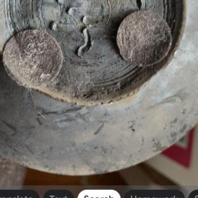 signature under the previous vase.