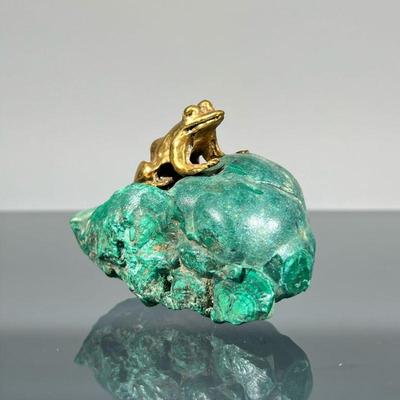 BRONZE & MALACHITE PAPERWEIGHT | Designed as a gilded brass frog upon a rough cut malachite stone fragment, no apparent markings. -...