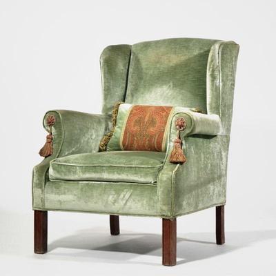Velvet Upholstered Wingchair | Finely upholstered in green velvet with scroll arms, tassels on the handholds, accompanied by a matching...