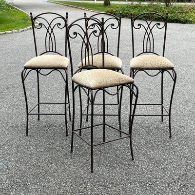 (4pc) WROUGHT IRON BARSTOOLS | Tall counter height bar stools with dark brown metal frames and patterned fabric seats; seat height 30 in....