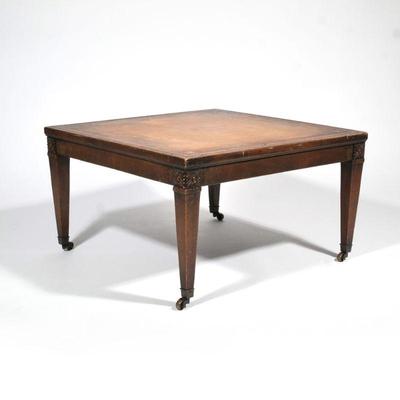 LEATHER TOP LOW TABLE | Coffee table having an inset leather top with gilt border and carved flower corners. - h. 15.5 x w. 27 x l. 27 in

