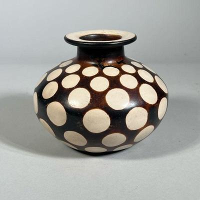 PERUVIAN SIGNED VASE | Signed "Jose Paz A / Chucucanas" having brown glaze with a spotted design. - h. 5 x dia. 5.75 in

