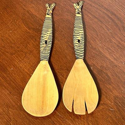 (2pc) PAIR ZEBRA SALAD SERVER | Carved and painted wood salad servers with Zebra-form handles. - l. 11 in

