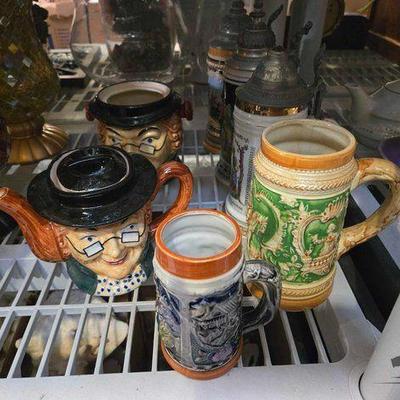 #2334 • (5) Ceramic Steins, Tea Pot & Container
