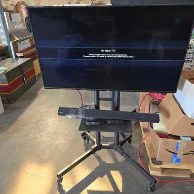 #7028 • Vizio 50" TV with Stand and Samsung Soundbar
