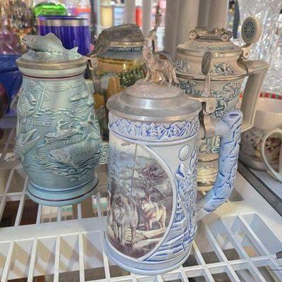 #2408 • (4) Steins With Lids
