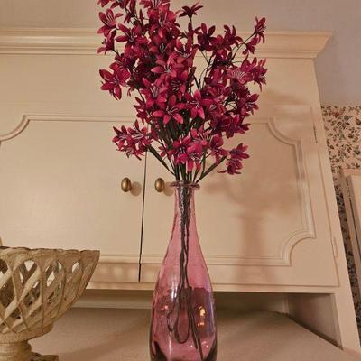 Red vase with flowers