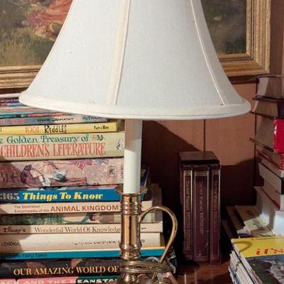 Brass lamp and great books
