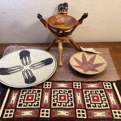 ROHU569 Africana	Handmade woven table runner or wall hanging (30x9); "Tears Women Weep" Handmade grass basket from Swaziland; 
