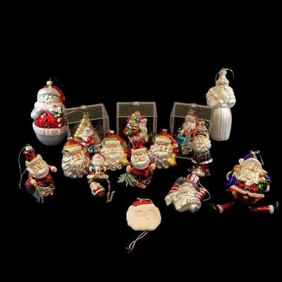 ROHU501 Here Comes Santa Claus Collection Of Decorative Santas	Assortment of Santa ornaments, including "God Bless America" and...
