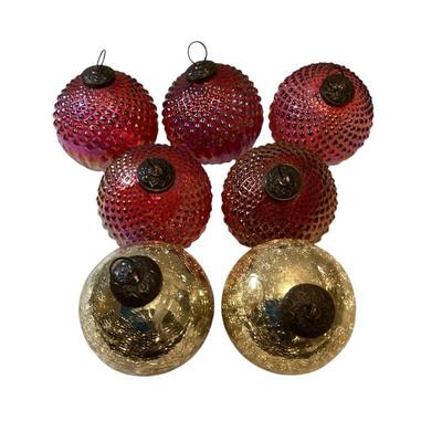 ROHU504 Seven Kugel-esque Christmas Ornaments	Heavy glass balls, 5 persimmon and 2 metallic crackle gold. 
